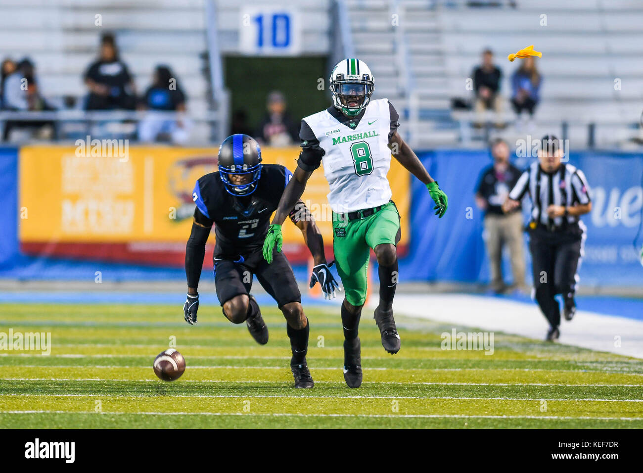 Nashville. 20th Oct, 2017. MTSU cornerback Charvarius Ward (2) draws a flag on Marshall wide receiver Tyre Brady (8) during the game between Marshall Thundering Herd and MTSU Blue Raiders at Johnny ''Red'' Floyd Stadium in Nashville. TN. Thomas McEwen/CSM/Alamy Live News Stock Photo