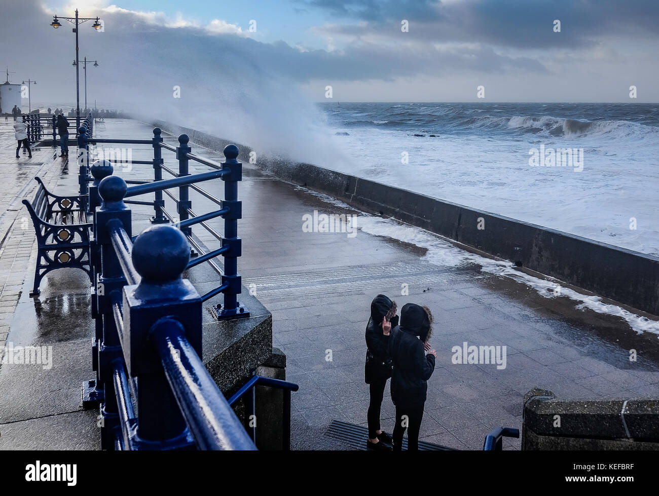 Porthcawl, UK. 21st Oct, 2017. UK Weather. Storm Brian hitting the coastal town of Porthcawl South Wales UK. Reckless storm chasers Credit: Sian Pearce Gordon/Alamy Live News Stock Photo