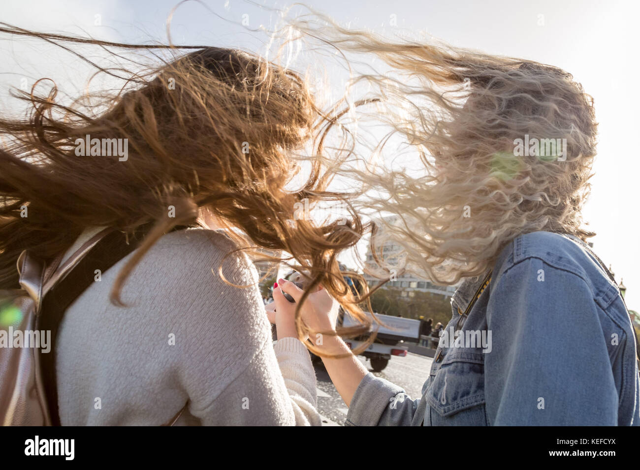 London, UK. 21st Oct, 2017. UK Weather: Storm Brian brings strong winds to city tourists on Waterloo bridge. Credit: Guy Corbishley/Alamy Live News Stock Photo