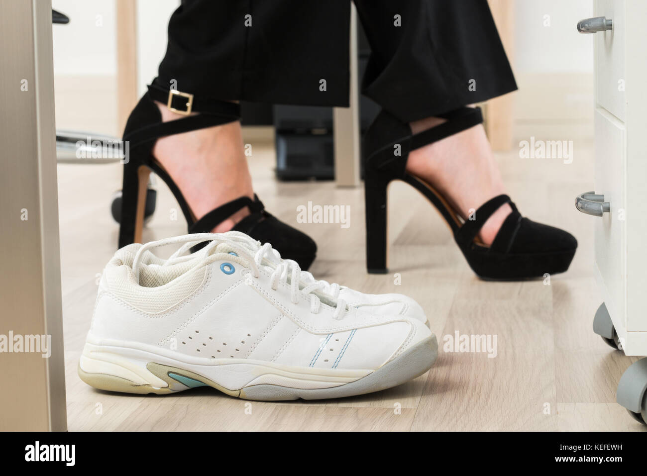 Woman white trainers hires stock photography and images Alamy