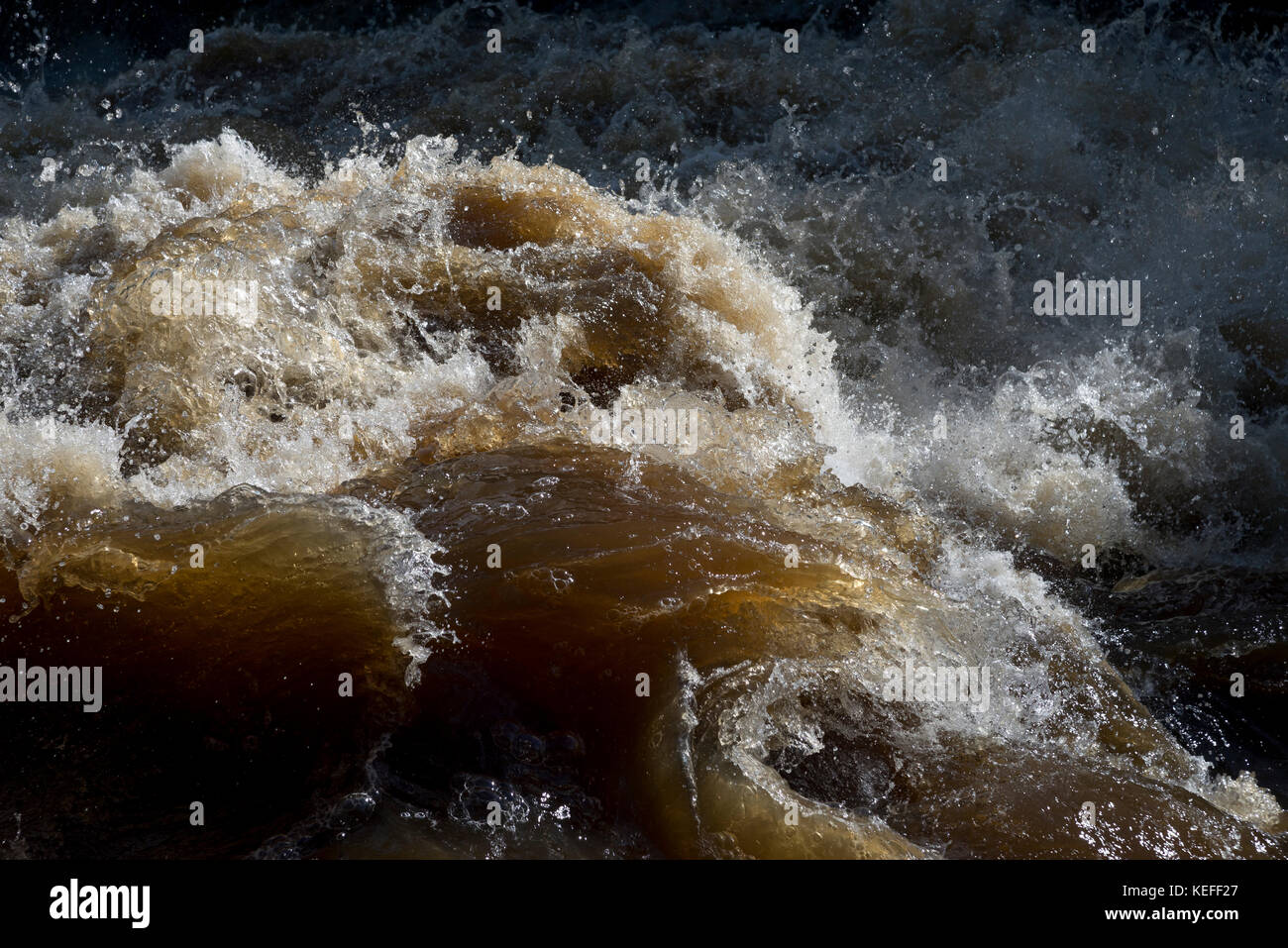 Watery abstract of the river Ure in full flow after heavy rain at Aysgarth in Wensleydale, Yorkshire Dales, England. Stock Photo