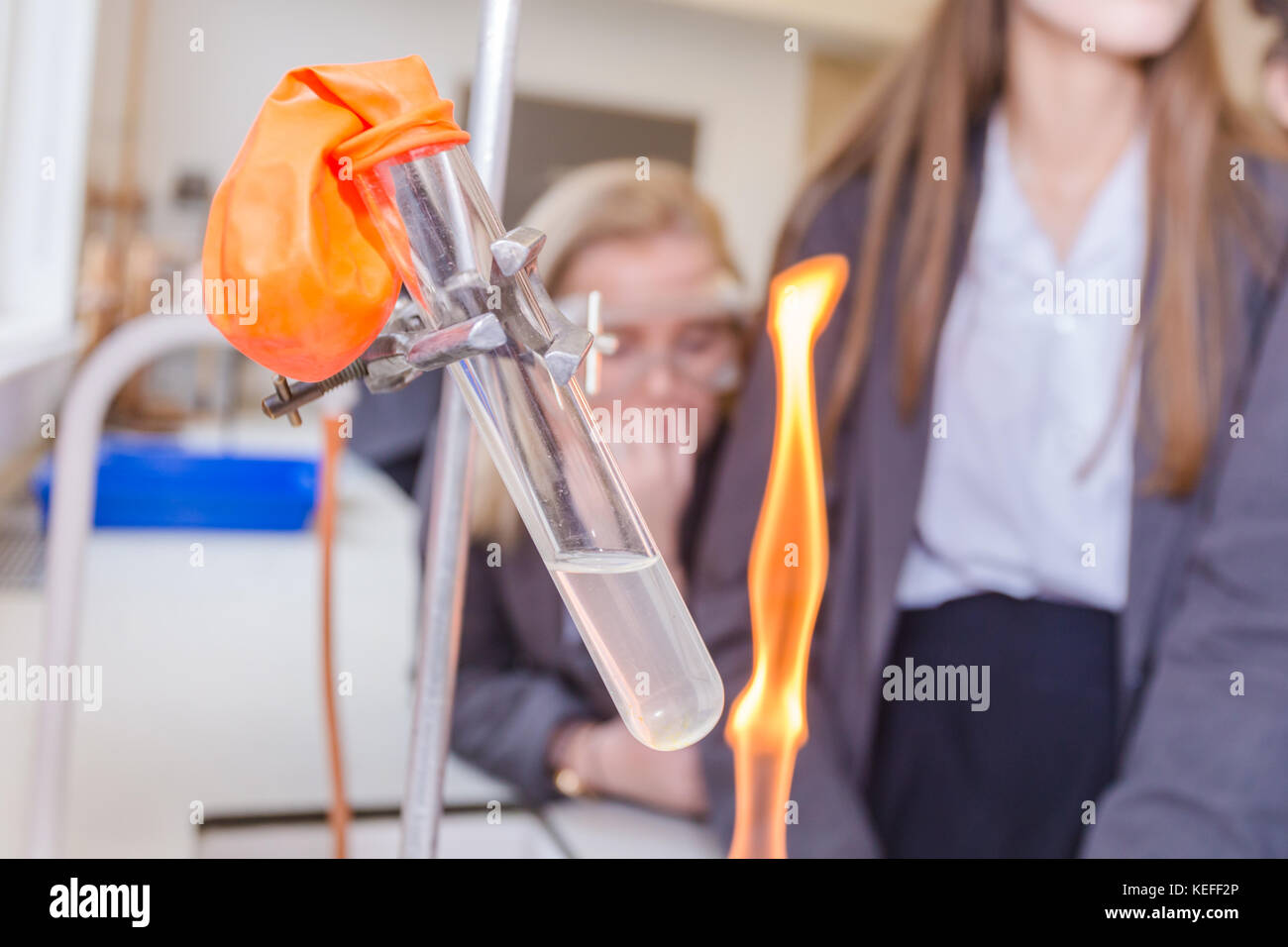 Secondary school UK science lesson with bunsen burner experiment Stock Photo