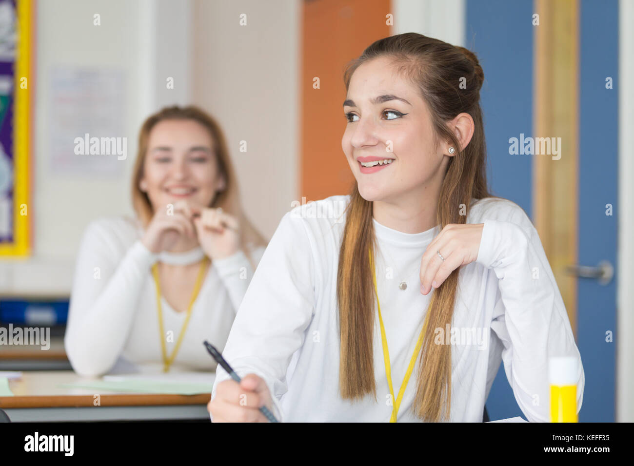 Pretty sixth form student enjoying her school lesson UK Stock Photo