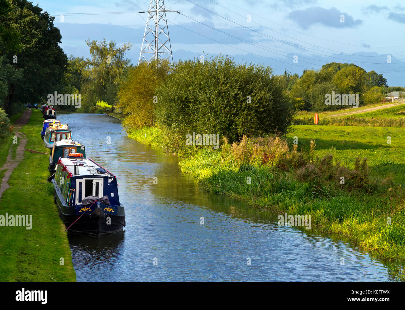 Narrow boats on the Trent and Mersey Canal near Willington in south Derbyshire England Stock Photo