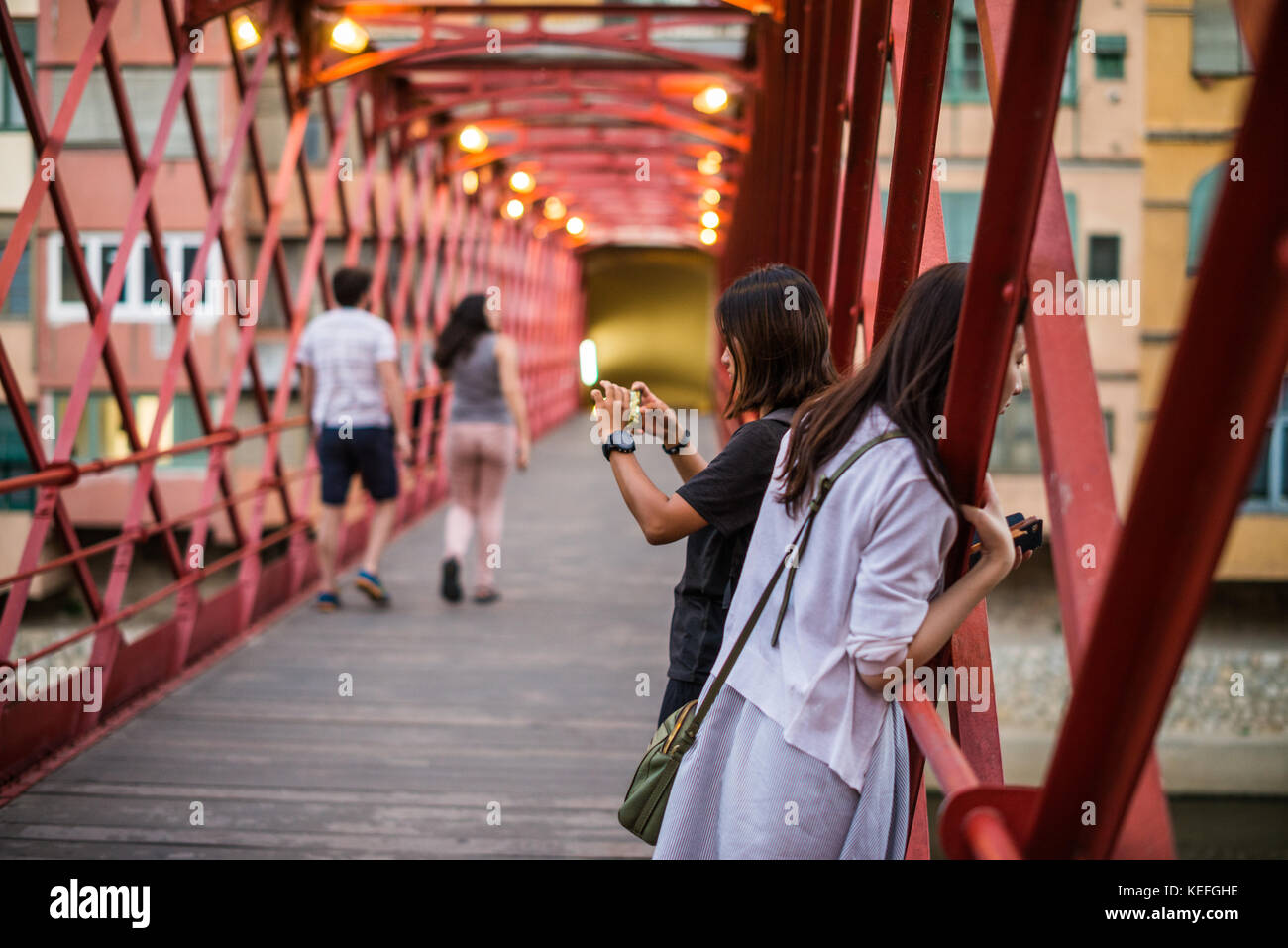 Asian girls on the bridge, Girona, Catalonia, Spain, Europe. Stock Photo