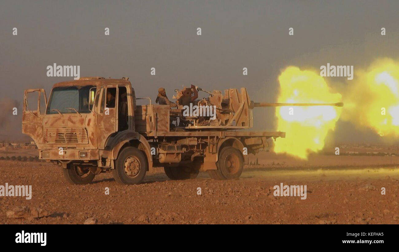 Still image taken from a propaganda video released October 16, 2017 showing Tahrir al-Sham in clashes against the Islamic State during battles in Al-Rihan Village east of Hama, Syria. HTS jihadists formed from former al-Nusra Front fighters have been fighting the Islamic State for control or the region. Stock Photo