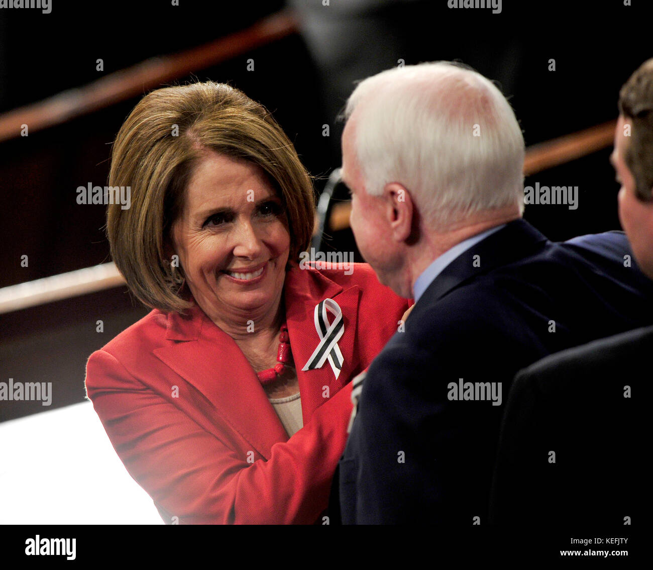 United States House Democratic Leader Nancy Pelosi (Democrat of California), left, greets U.S. Senator John McCain (Republican of Arizona), right, following U.S. President Barack Obama's State of the Union Address to a Joint Session of Congress in the U.S. Capitol in Washington, D.C. on Tuesday, January 25, 2011..Credit: Ron Sachs / CNP.(RESTRICTION: NO New York or New Jersey Newspapers or newspapers within a 75 mile radius of New York City) /MediaPunch Stock Photo