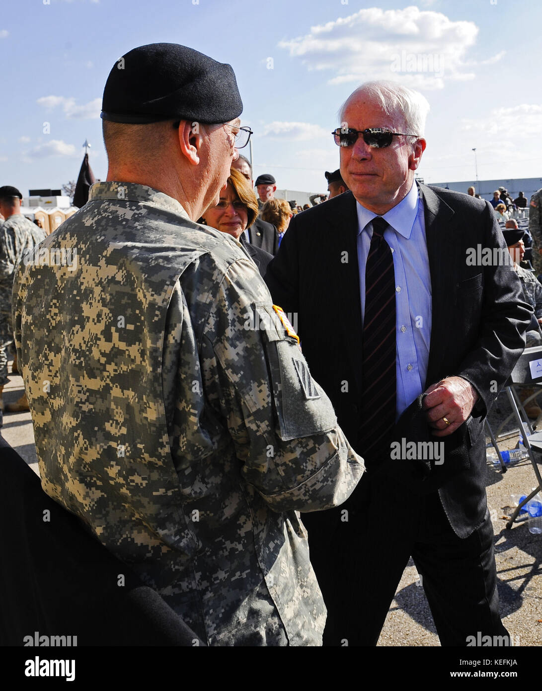 Fort Hood, TX - November 10, 2009 -- U.S. Senator John McCain (Republican of Arizona) (R) greets a soldier as he departs the memorial service for the 12 soldiers and one civilian killed at Fort Hood U.S Army Post near Killeen, Texas, USA 10 November 2009. Army Major Malik Nadal Hasan reportedly shot and killed 13 people, 12 soldiers and one civilian, and wounded 30 others in a rampage 05 November at the base's Soldier Readiness Center where deploying and returning soldiers undergo medical screenings.  .Credit: Tannen Maury / Pool via CNP /MediaPunch Stock Photo