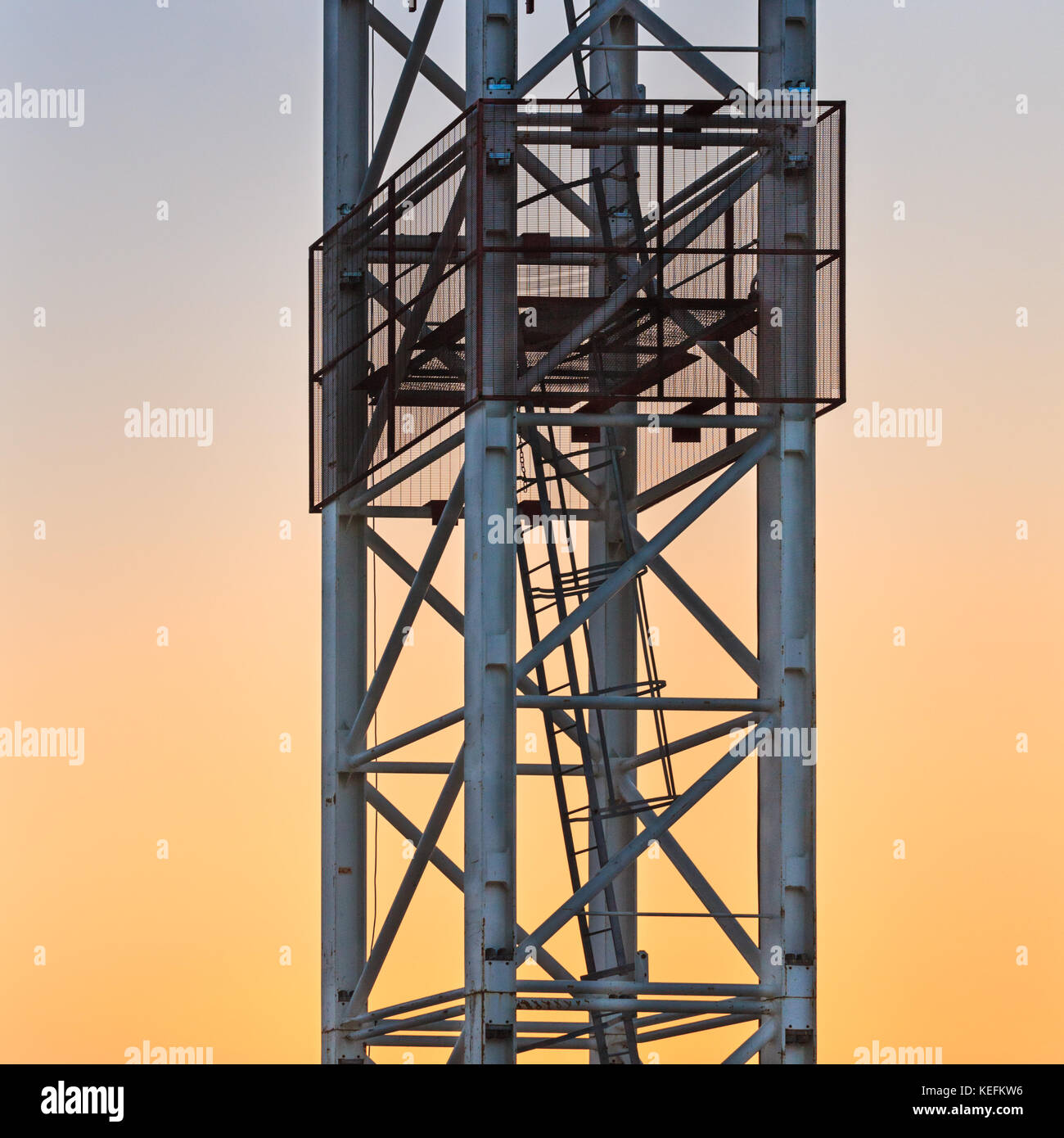 Tower crane mast detail shot against sunset sky Stock Photo Alamy