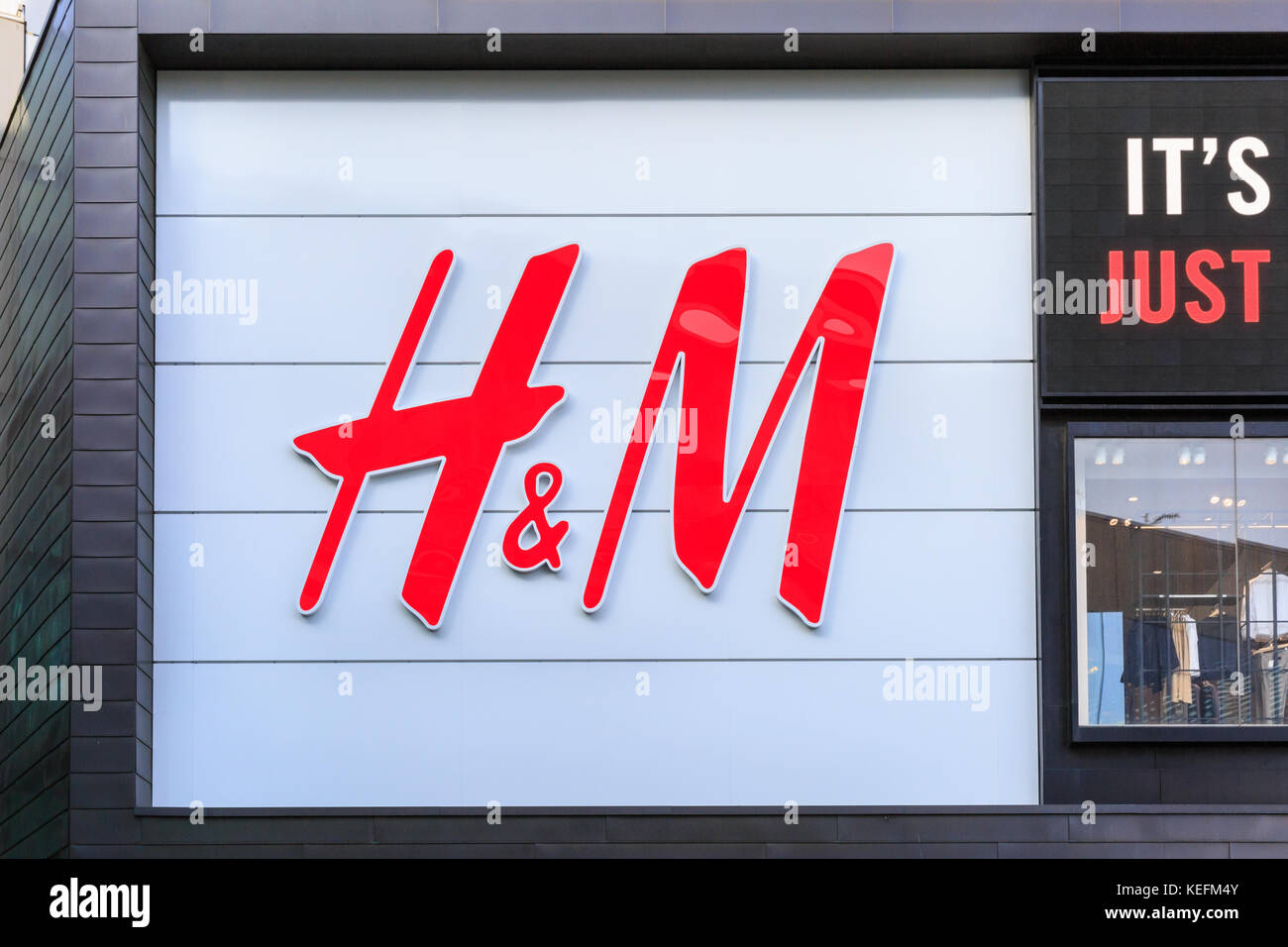 H&M shop sign, brand logo of Hennes & Mauritz clothing fashion retailer,  exterior, Westfield Stratford, London Stock Photo - Alamy