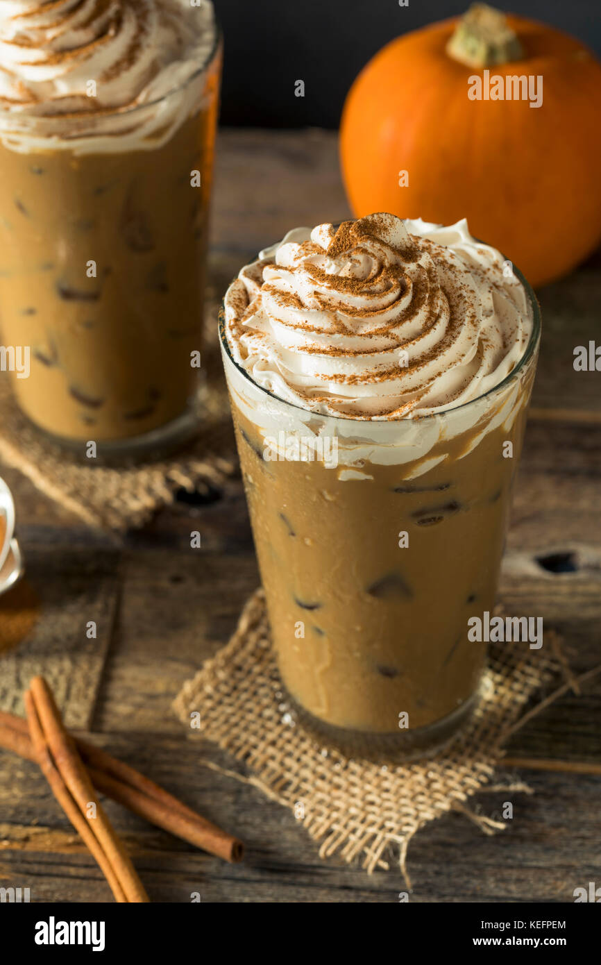 Sweet Iced Pumpkin Spice Latte with Whipped Cream Stock Photo - Alamy