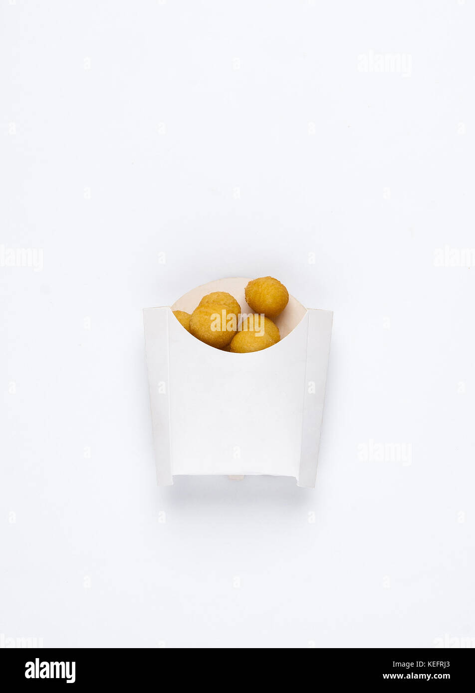 fried chicken balls in a white box on a white background. studio picture of fried chicken balls Stock Photo