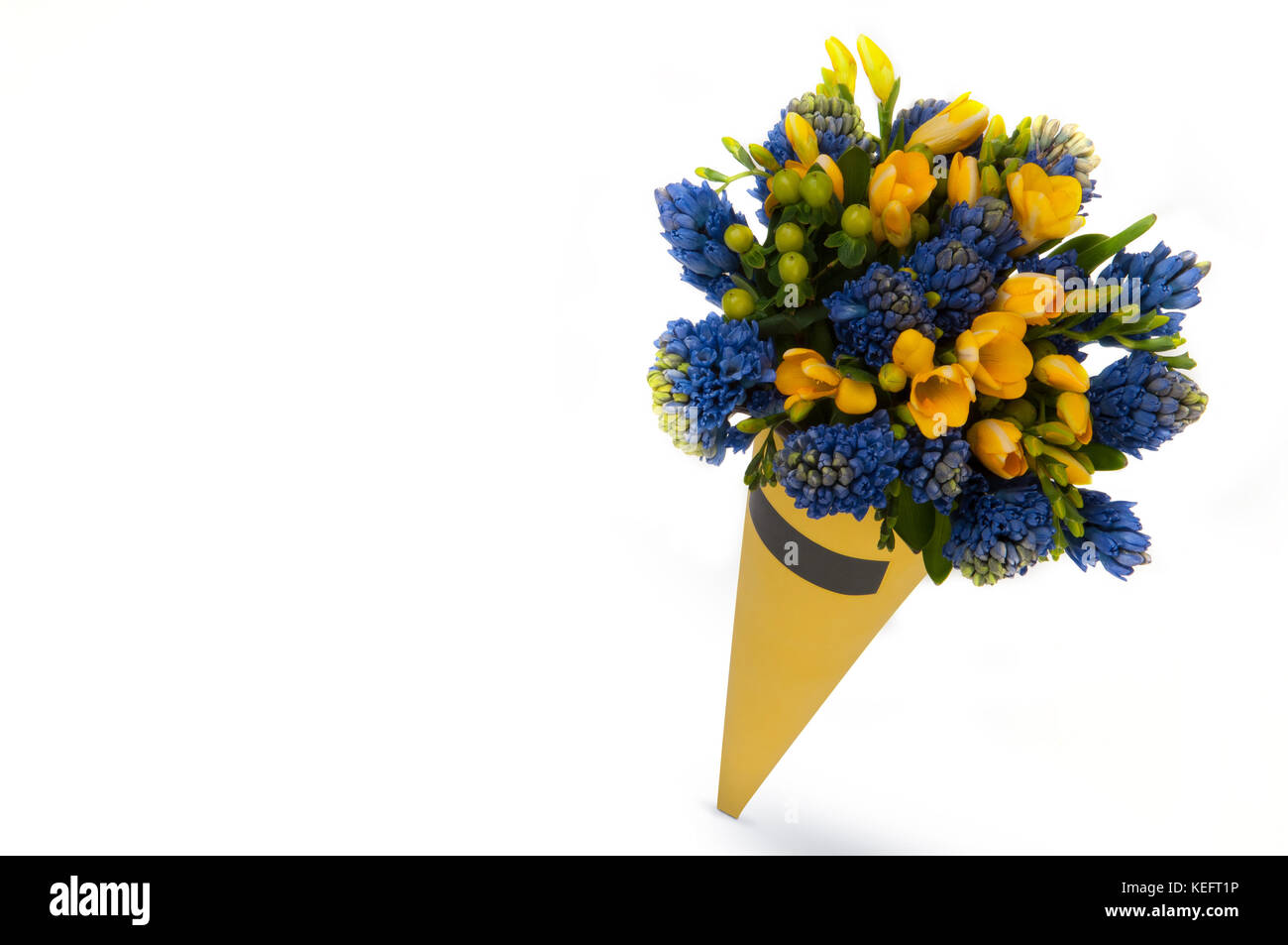 crocus flowers in a bouquet in a cone shape on a white background