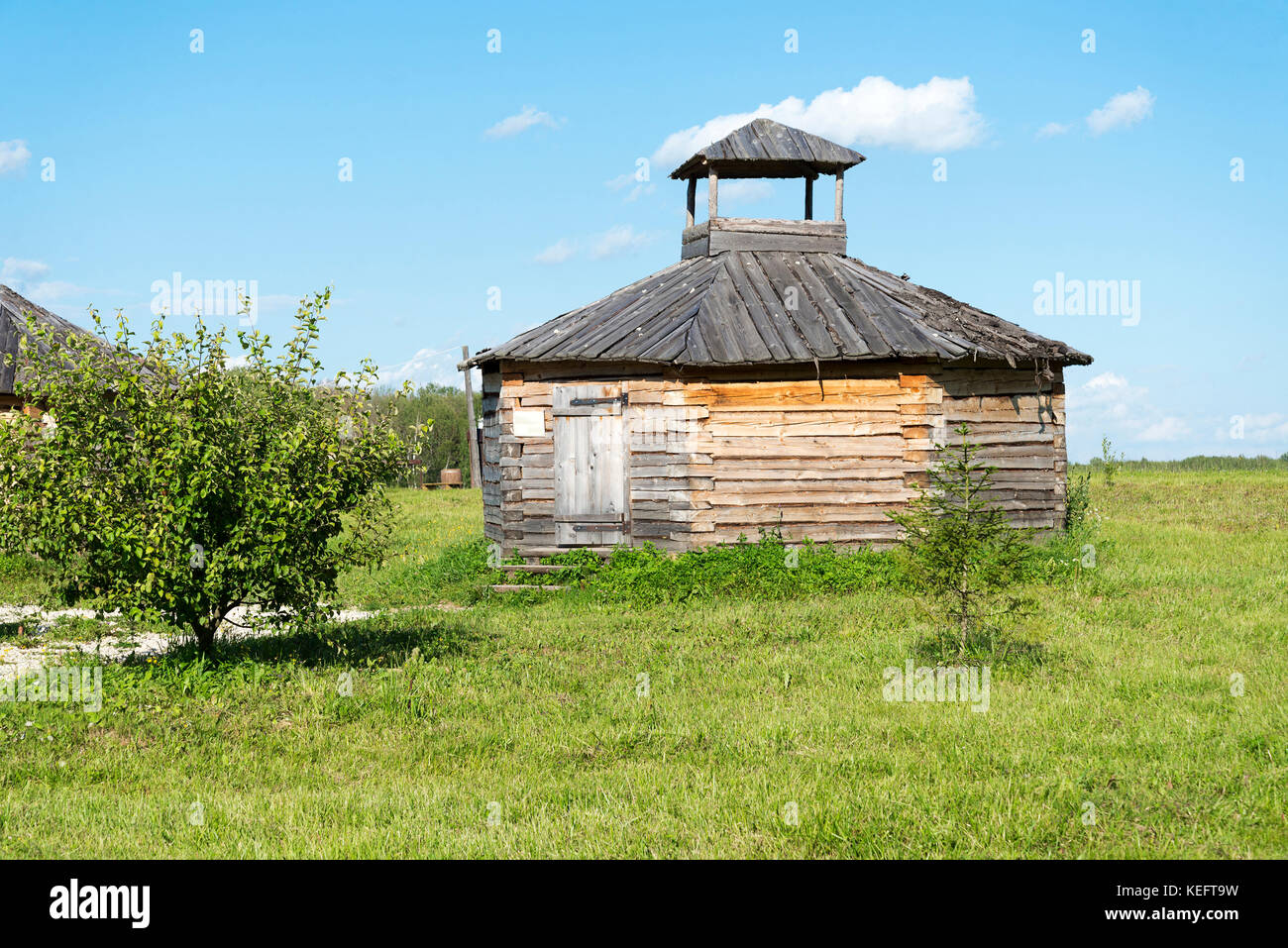 Old small wooden house in the village in a Sunny summer day Stock Photo ...