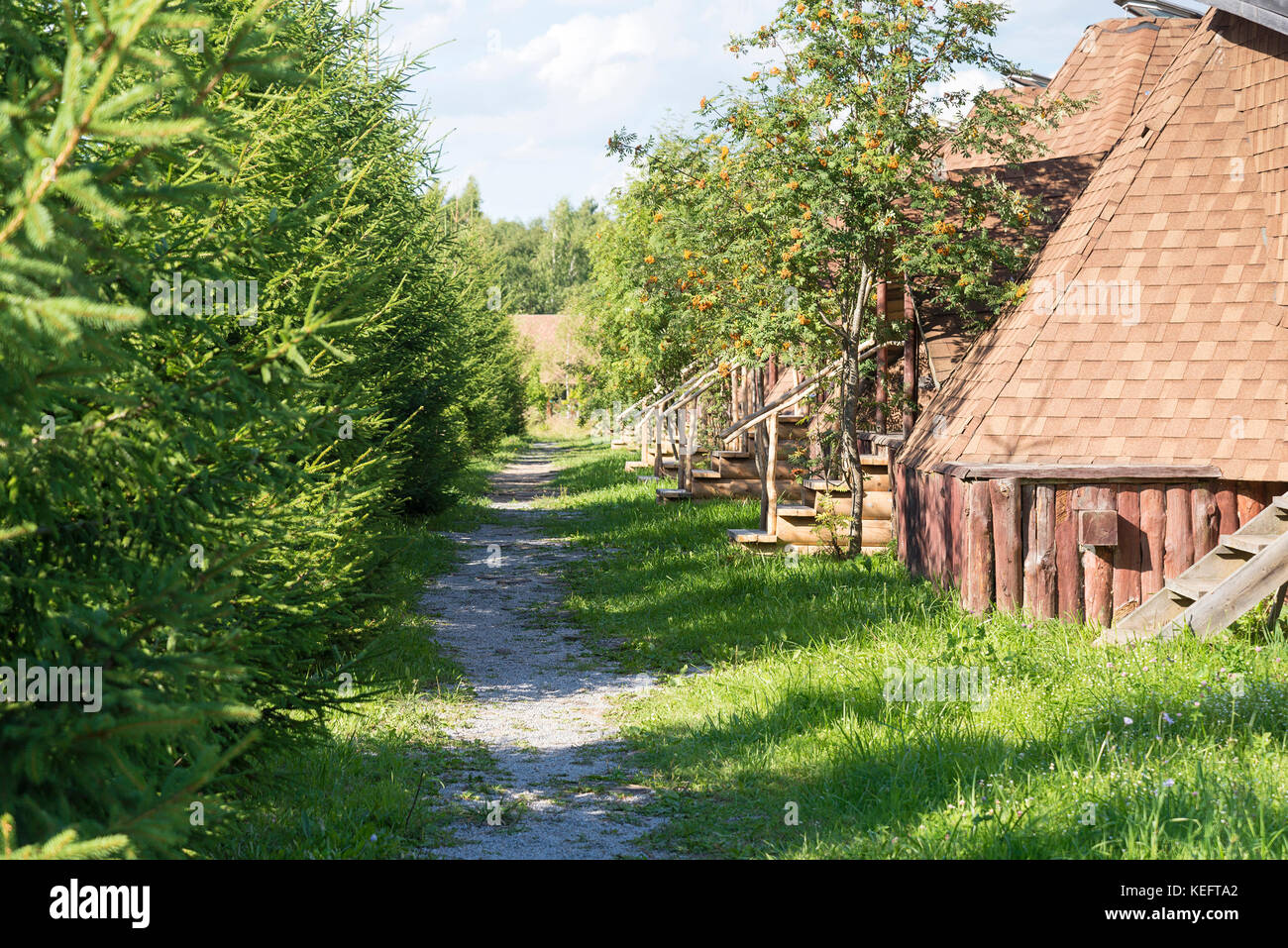 Old small wooden house in the village in a Sunny summer day Stock Photo ...