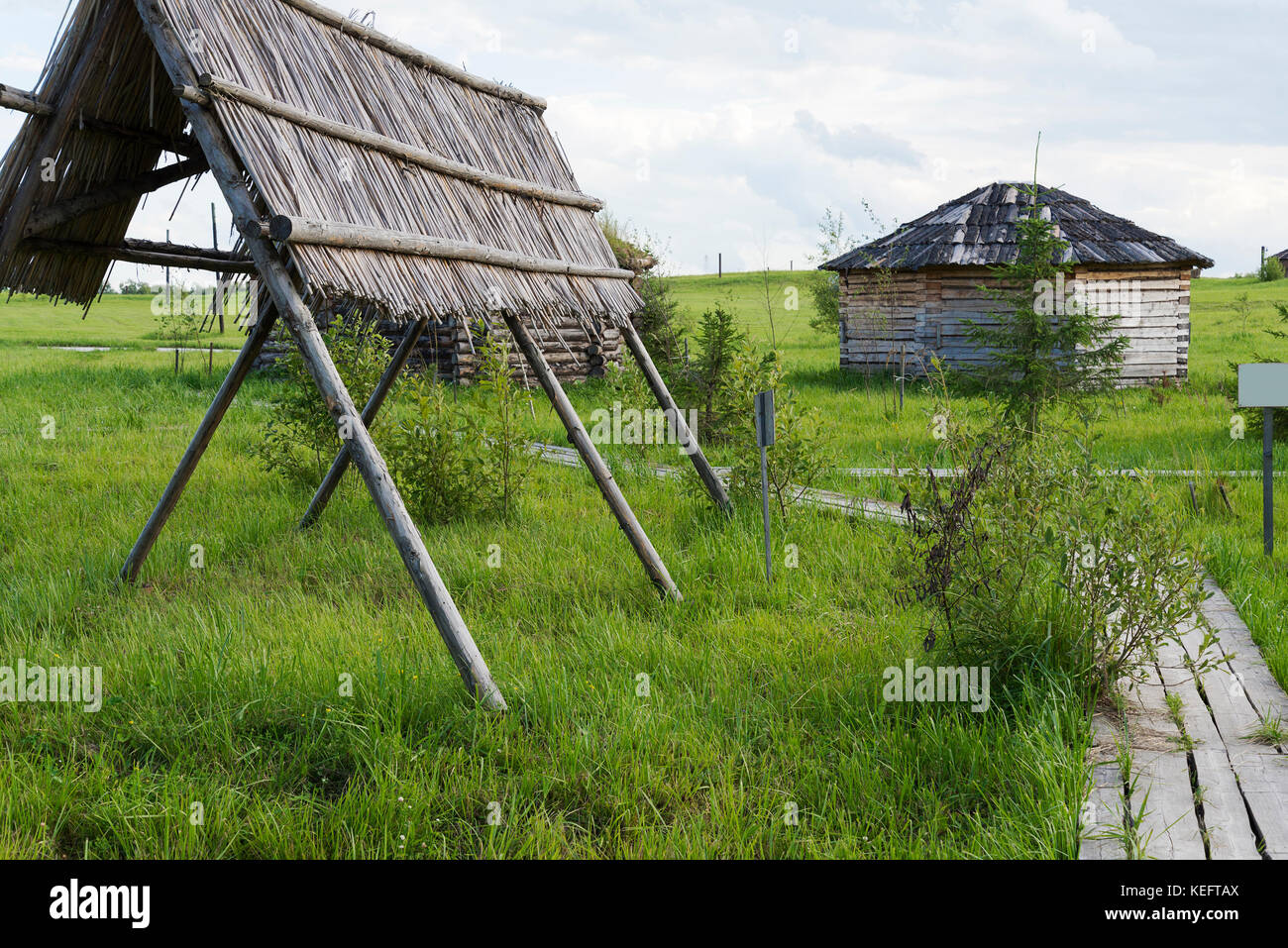 Old small wooden house in the village in a Sunny summer day Stock Photo ...
