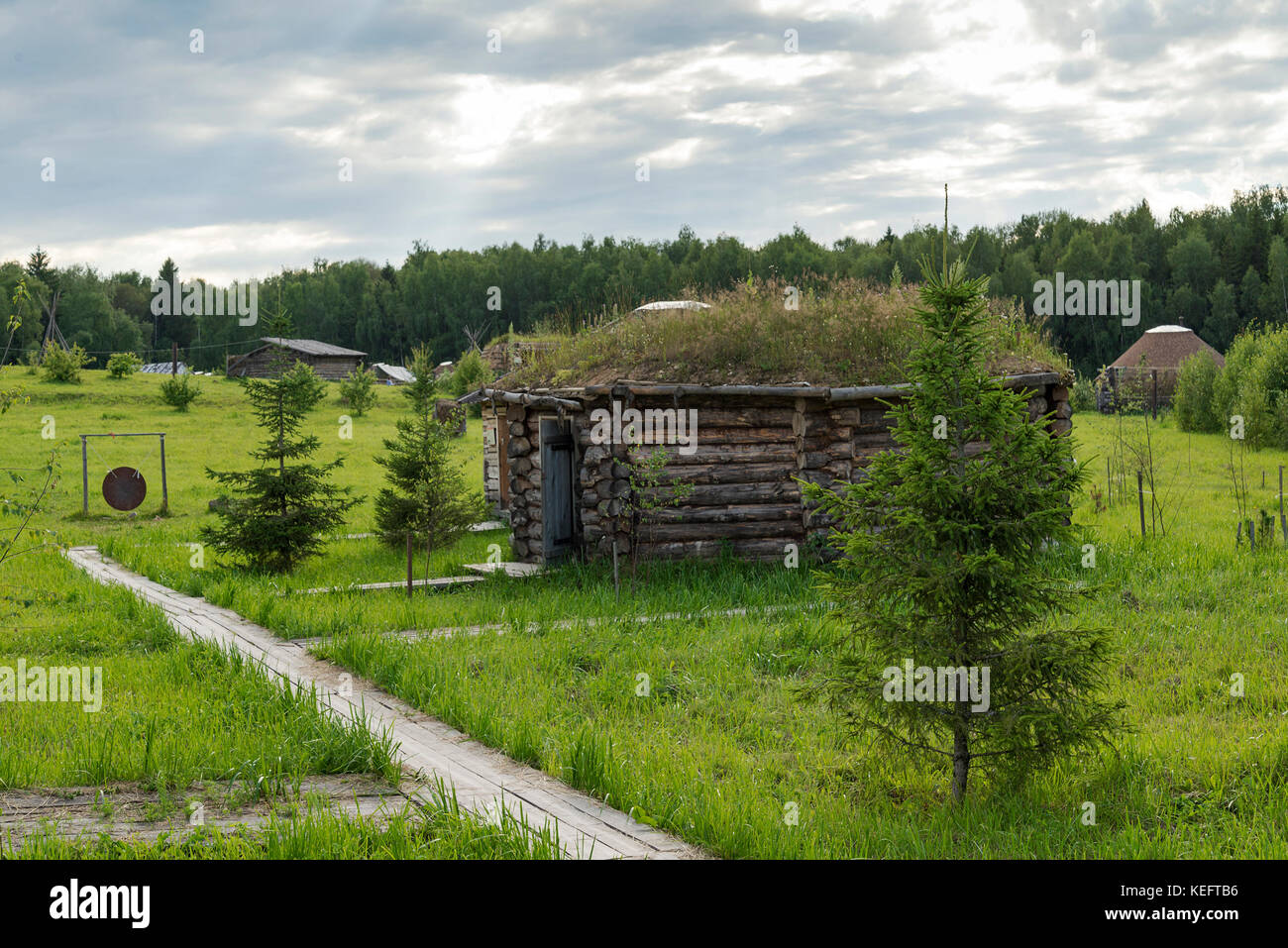 Old small wooden house in the village in a Sunny summer day Stock Photo ...