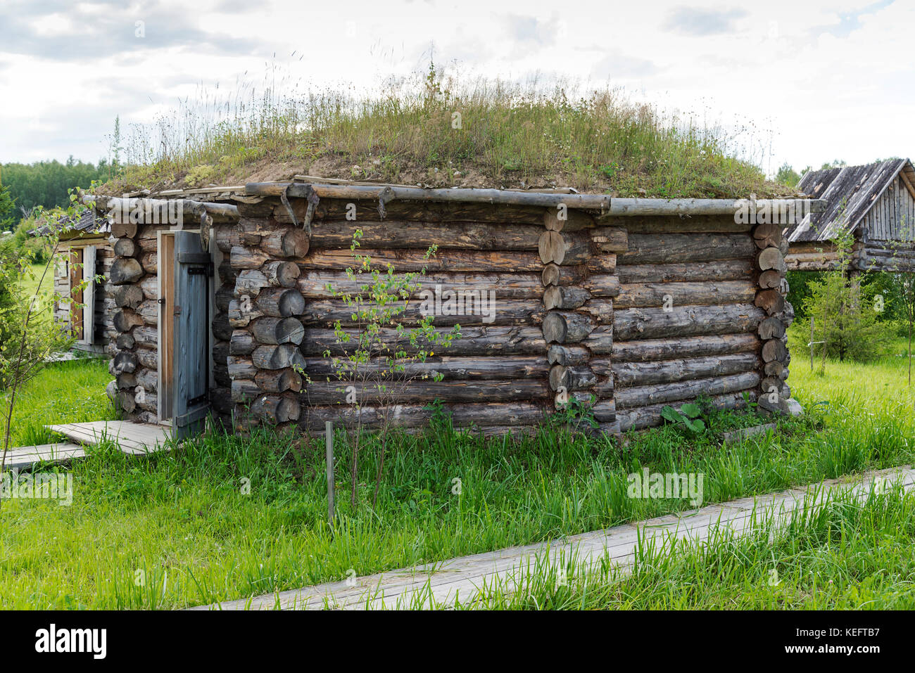 Old small wooden house in the village in a Sunny summer day Stock Photo ...