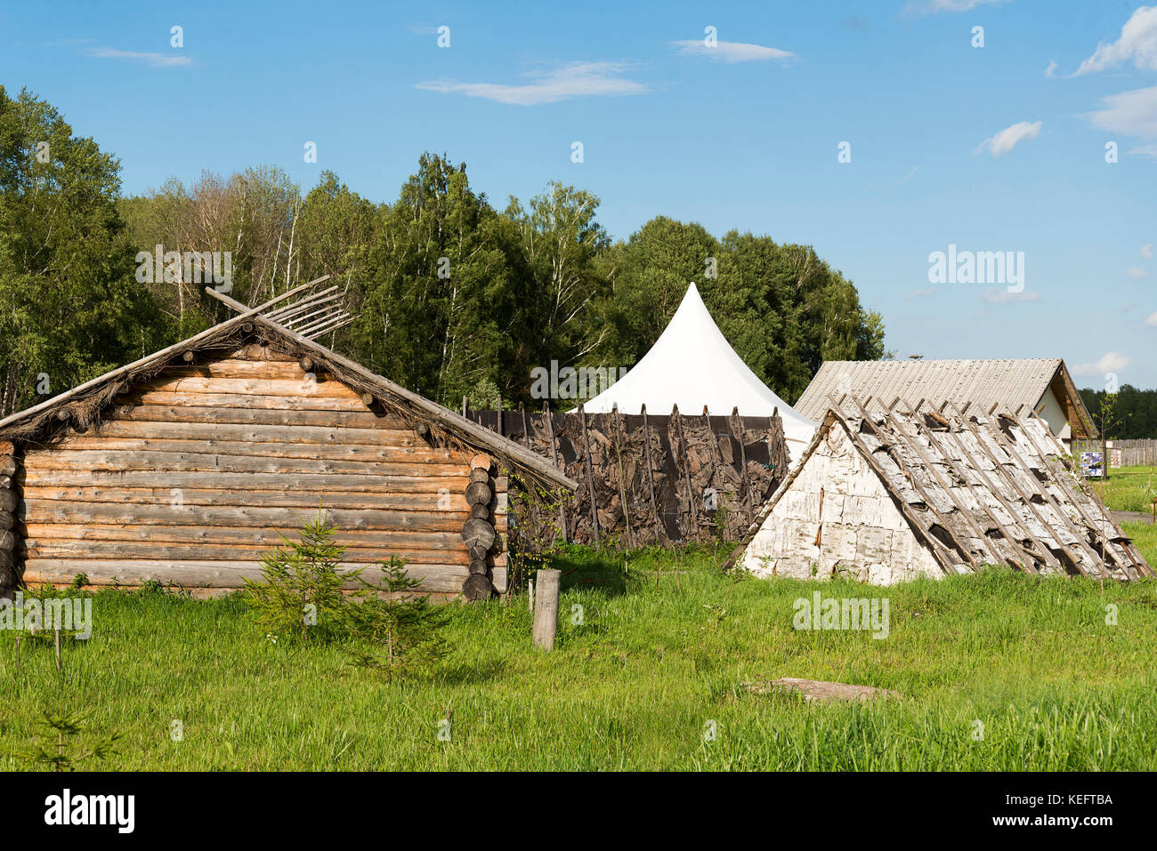 Old small wooden house in the village in a Sunny summer day Stock Photo ...