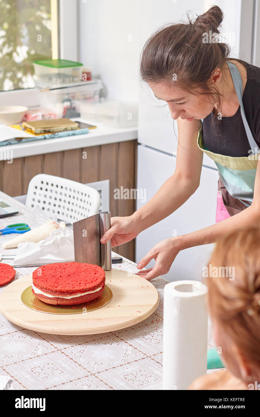 cake, red, alignment, cook, woman, kitchen, chef, baking, cooking, food pastry confectioner cakes making girl happyculinary dessert professional beaut Stock Photo