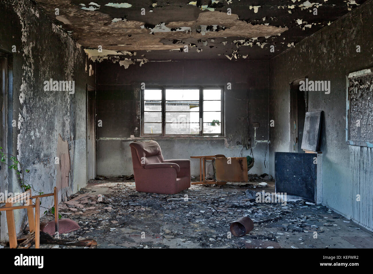 Burnt out office with chair, Isle of Wight, England, UK Stock Photo