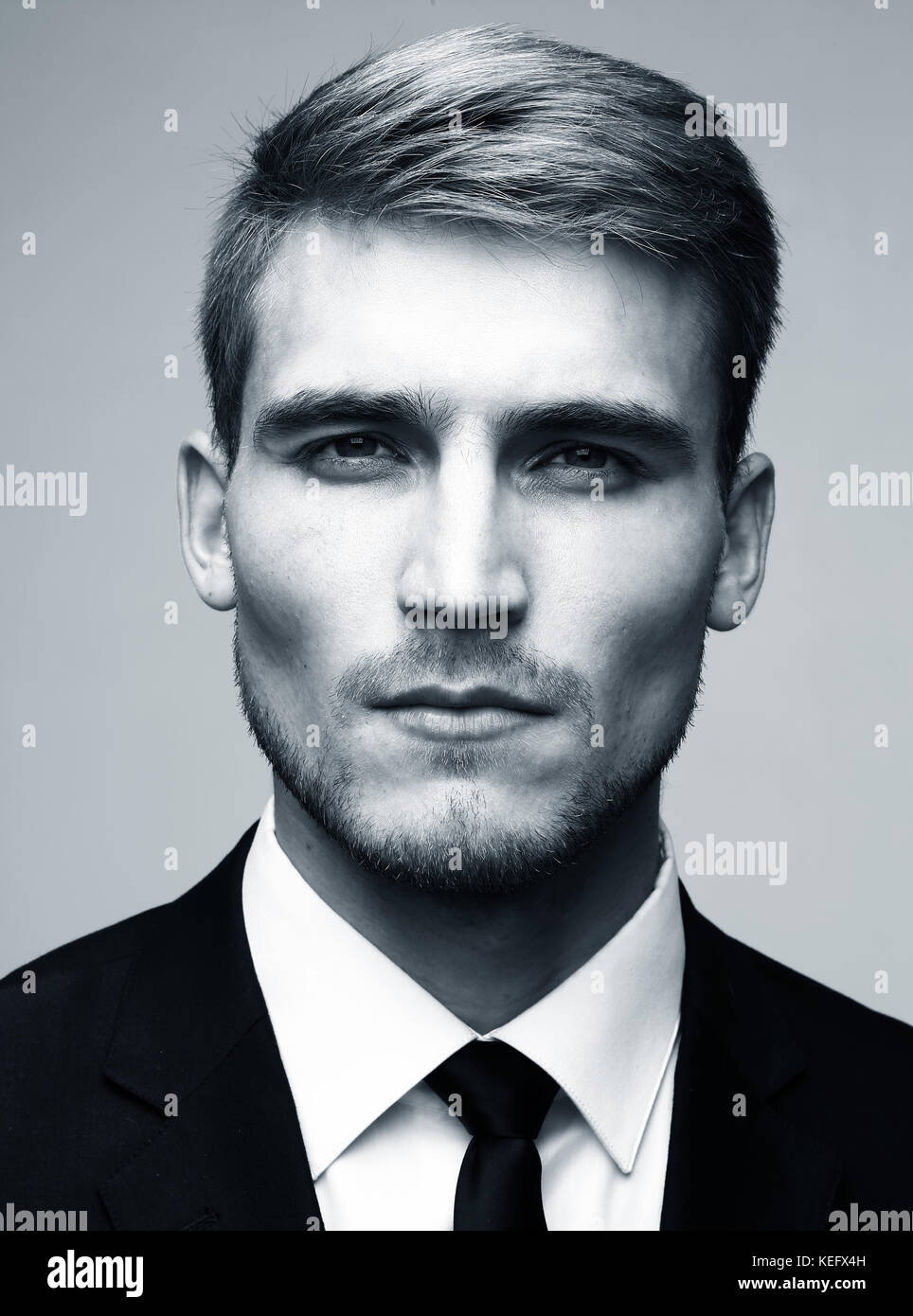 Black and white close-up portrait of a successful handsome business man ...