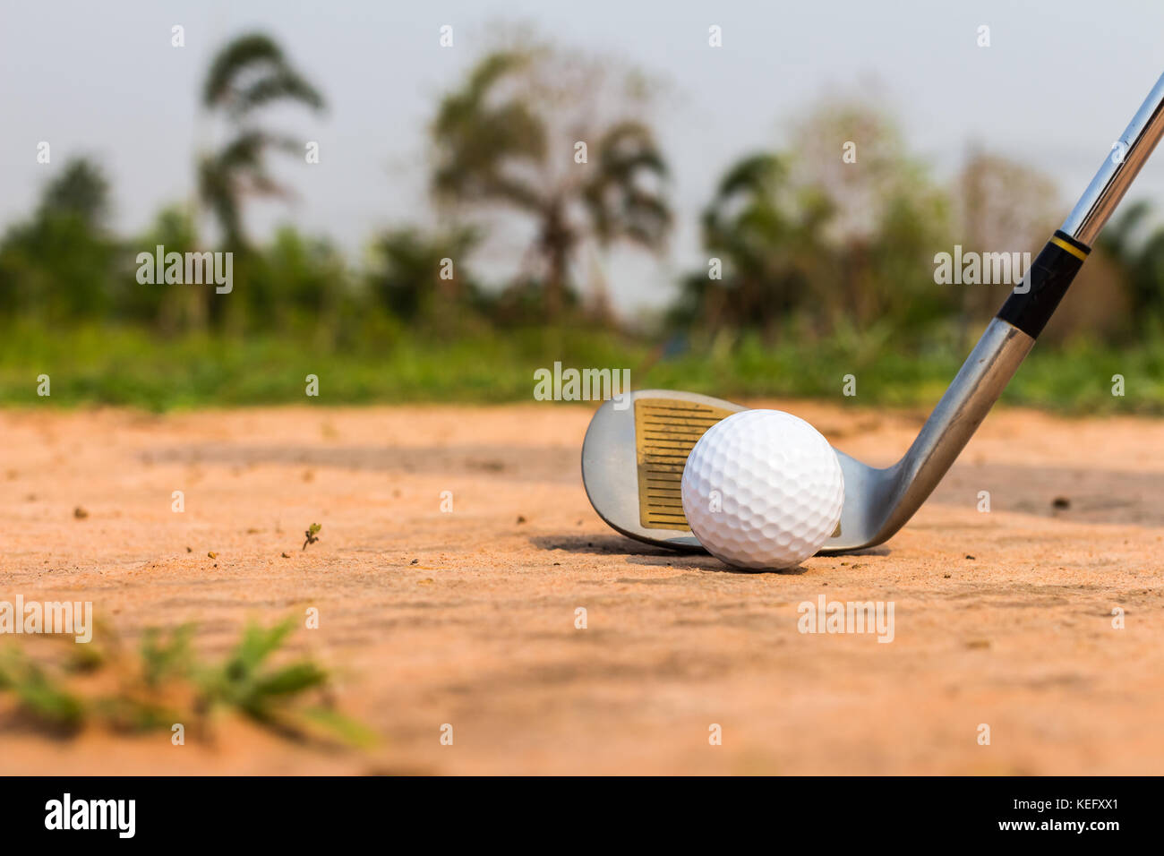 Golf Ball in Trap with Sand Stock Photo Alamy