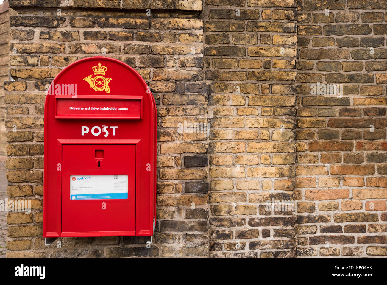 Red postbox, Denmark, Copenhagen Stock Photo
