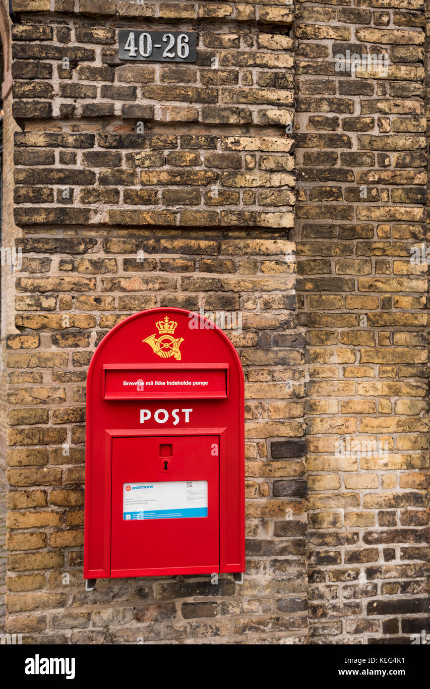 Red postbox, Denmark, Copenhagen Stock Photo