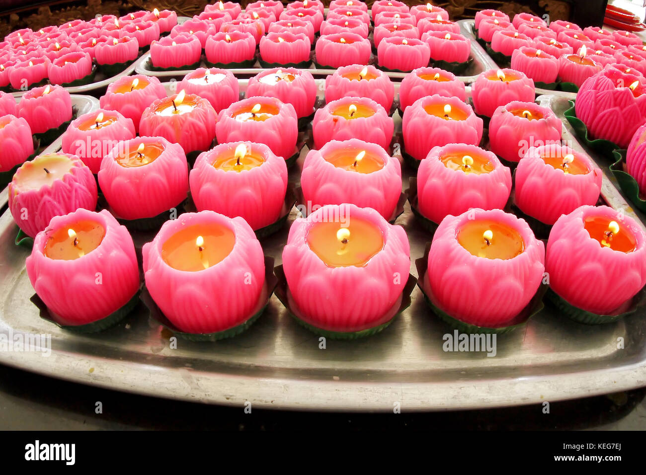 Pink Lotus Candles for an Offering at the Temple in Malaysia Stock Photo -  Alamy