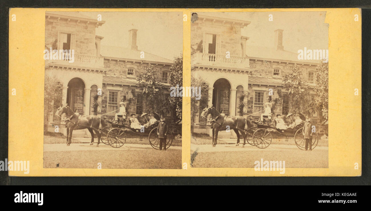 Coachman holding the reins of horse with people in coach, from Robert N. Dennis collection of stereoscopic views 2 Stock Photo