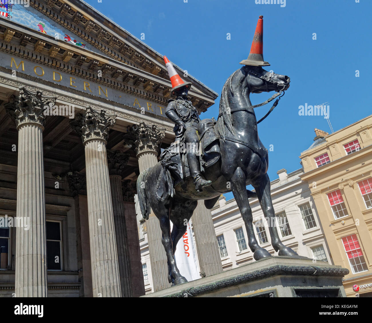 modern art text gallery of modern art the goma and the duke of wellington or  cone head man statue. Stock Photo