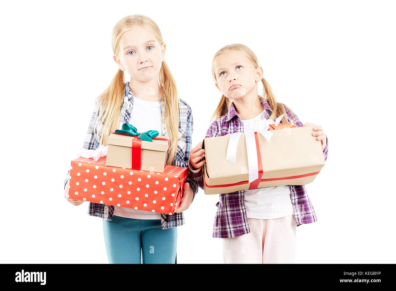 Sisters with Christmas gifts Stock Photo