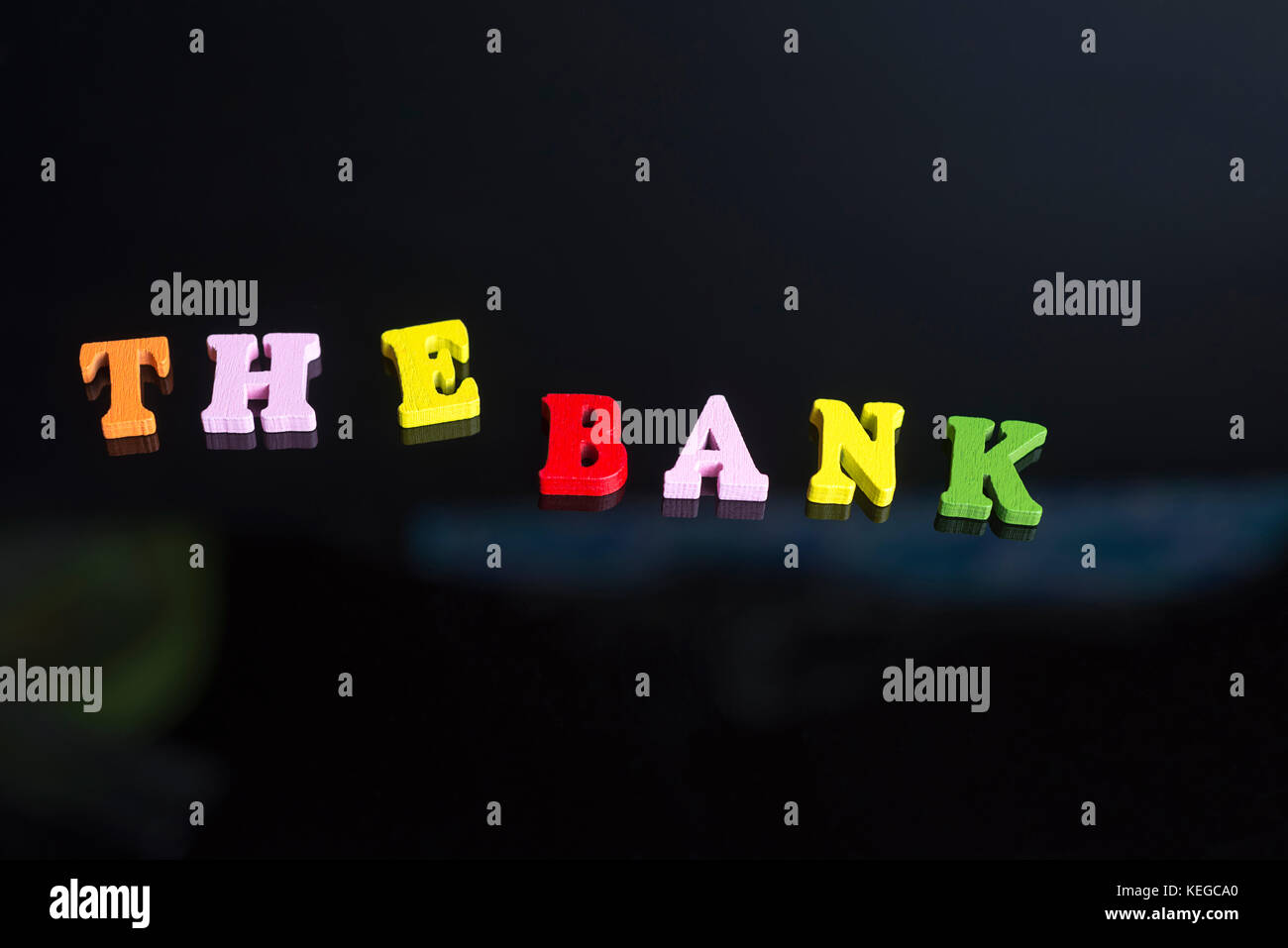 Word Bank Lettering A word Bank of colored letters on black background Stock Photo - Alamy