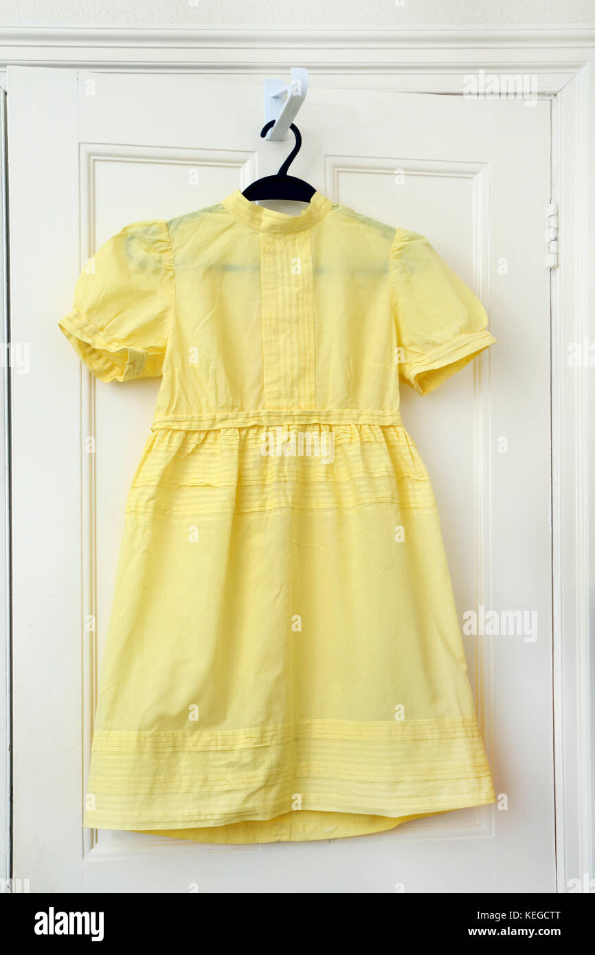 Vintage Handmade Yellow Dress Stock Photo