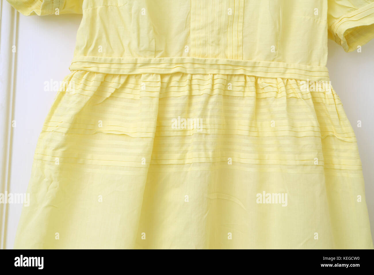Vintage Handmade Yellow Dress Stock Photo