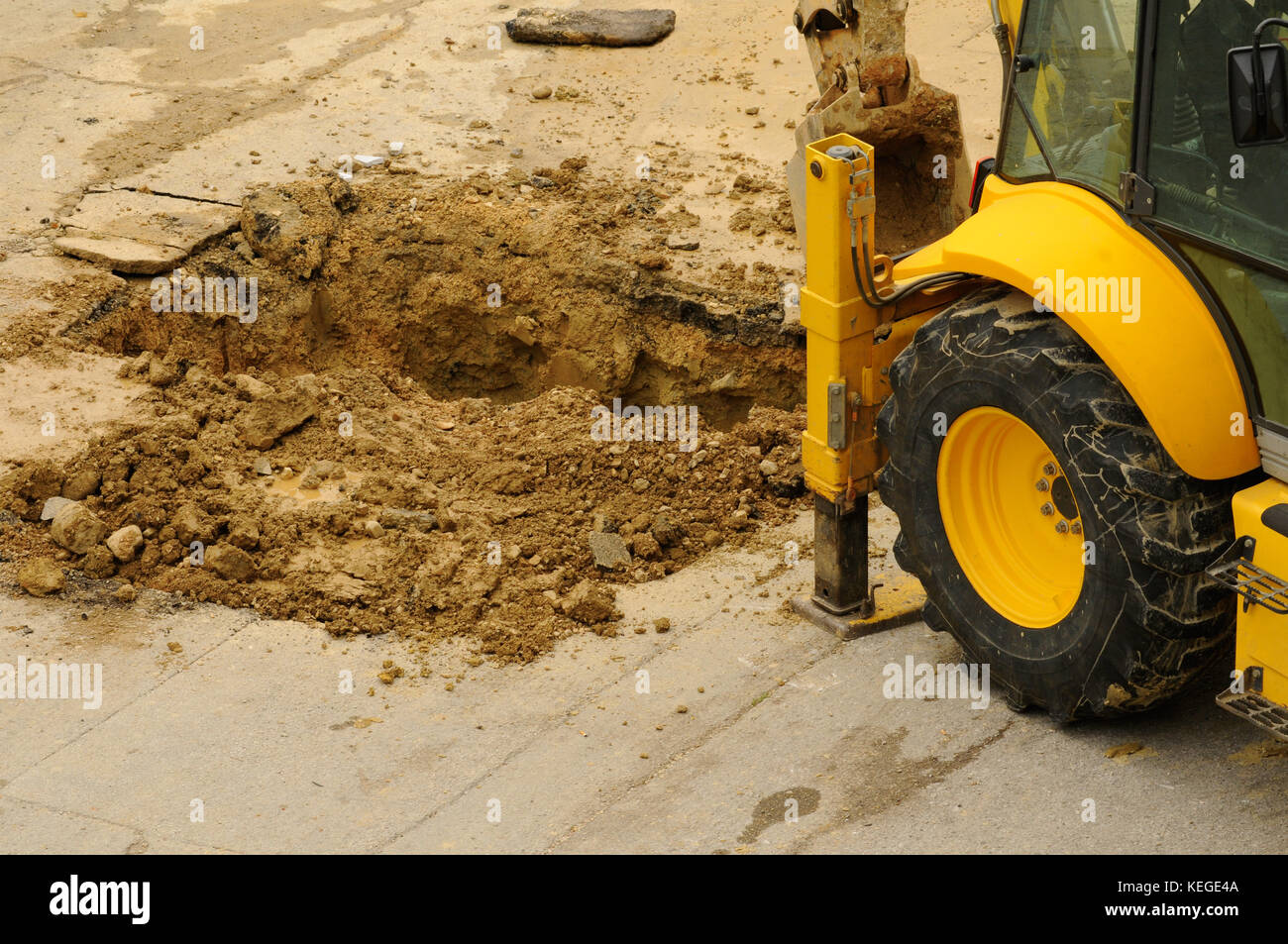 Excavator digging ditch Stock Photo