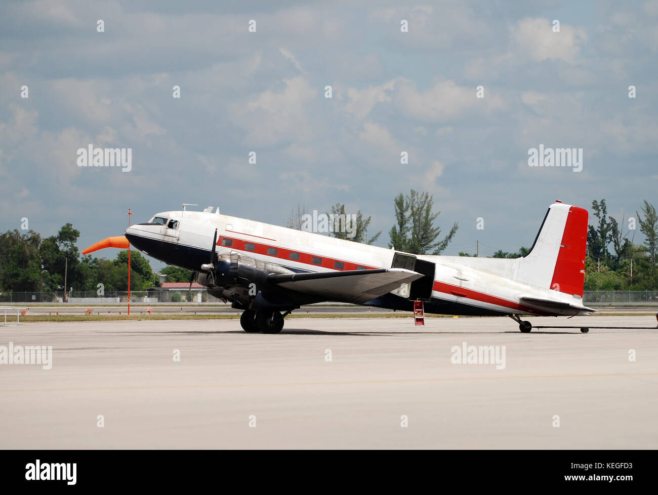 Old propeller driven airplane on a runway Stock Photo - Alamy