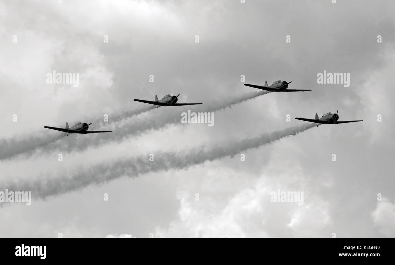 Formation of World War II era fighter planes Stock Photo