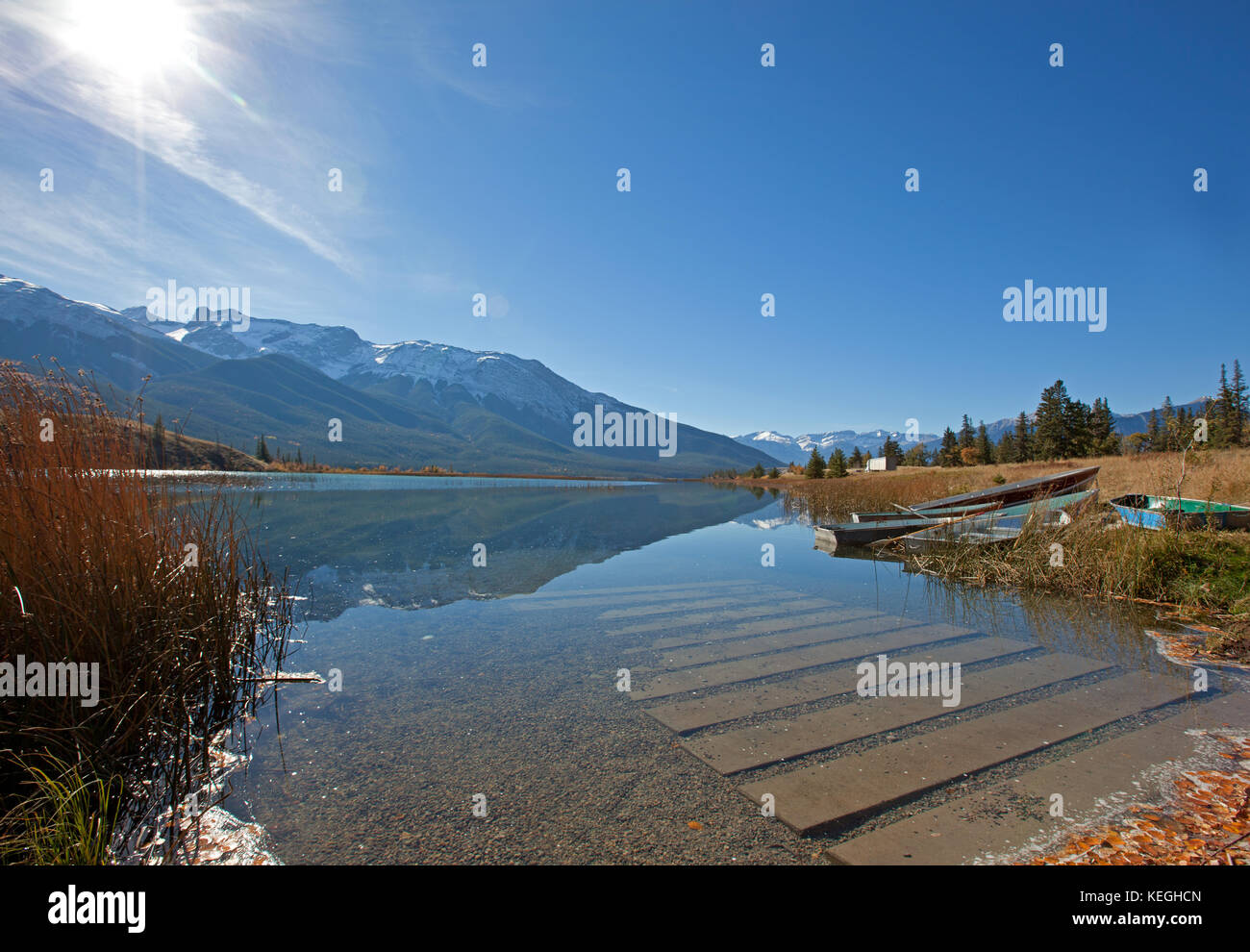 a boat launch and small rowboats beside talbot lake in Jasper National Park, Alberta Stock Photo