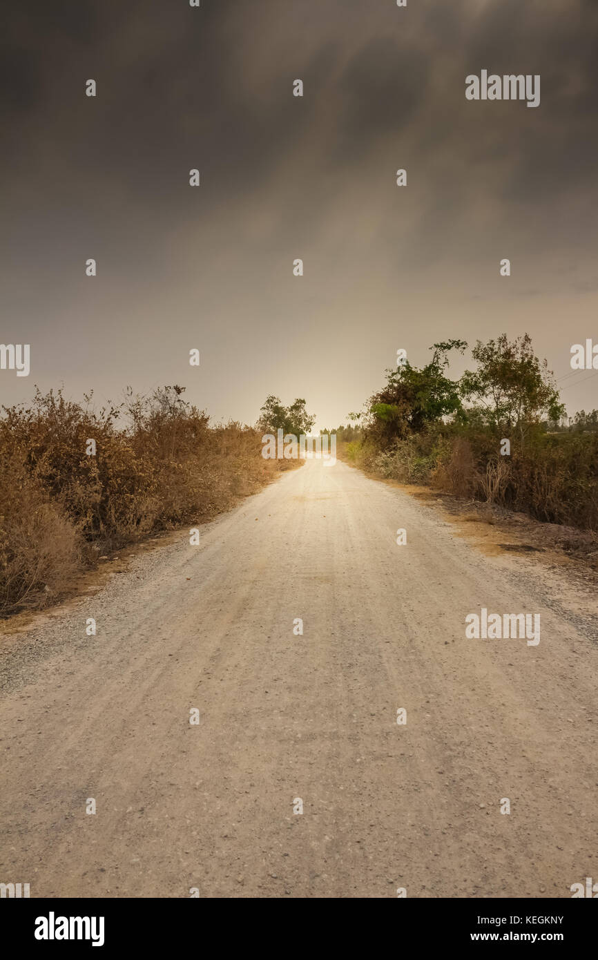 road in the desert and stormy sky Stock Photo - Alamy