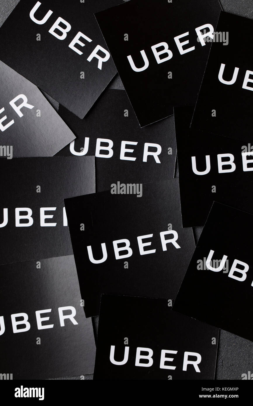 A photograph of  the Uber logo. Uber is a popular taxi style transport service application, founded in 2009 Stock Photo