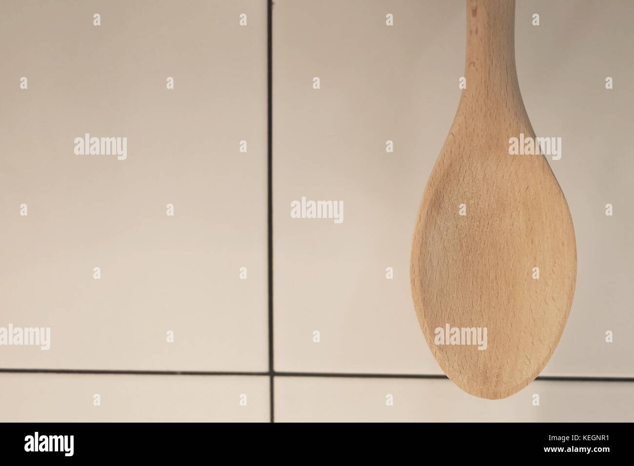 Wooden Spatula or Ladle Hanging on The Wall, Kitchen Utensil for Mixing