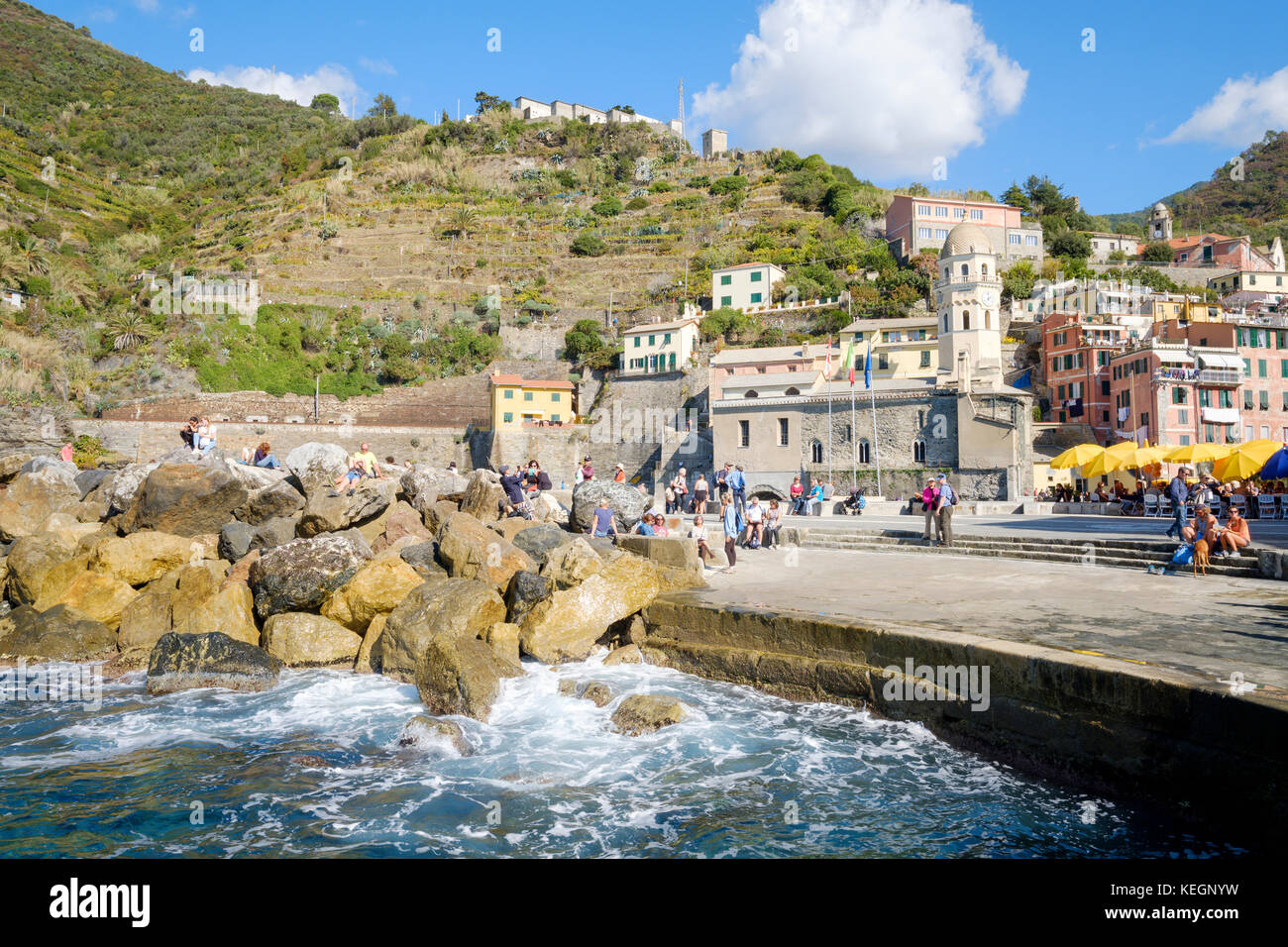 tourists gathered around the port area in Vernazza, Cinque Terre, Liguria, Italy Stock Photo