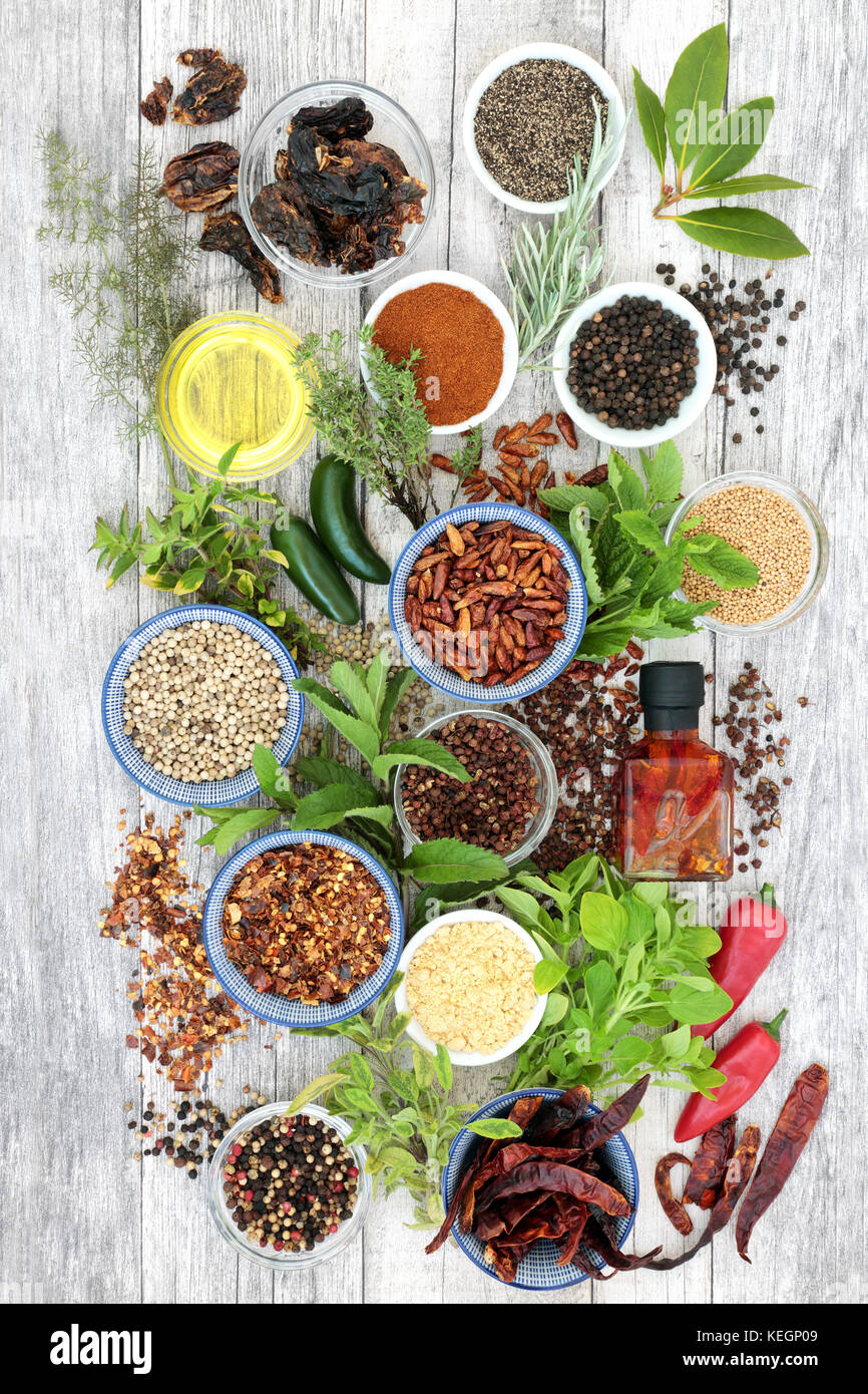 Hot herb and spice seasoning with fresh herbs, chilli pepper selection
