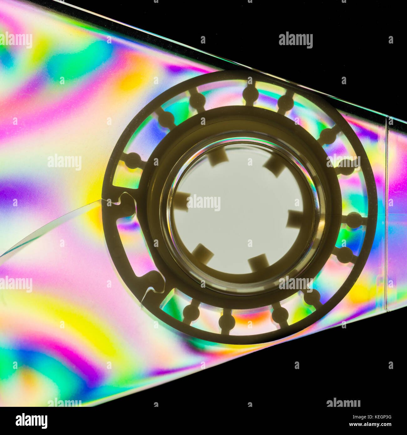 A colourful macro shot of a plastic cassette tape shot through linear polarising film. Stock Photo