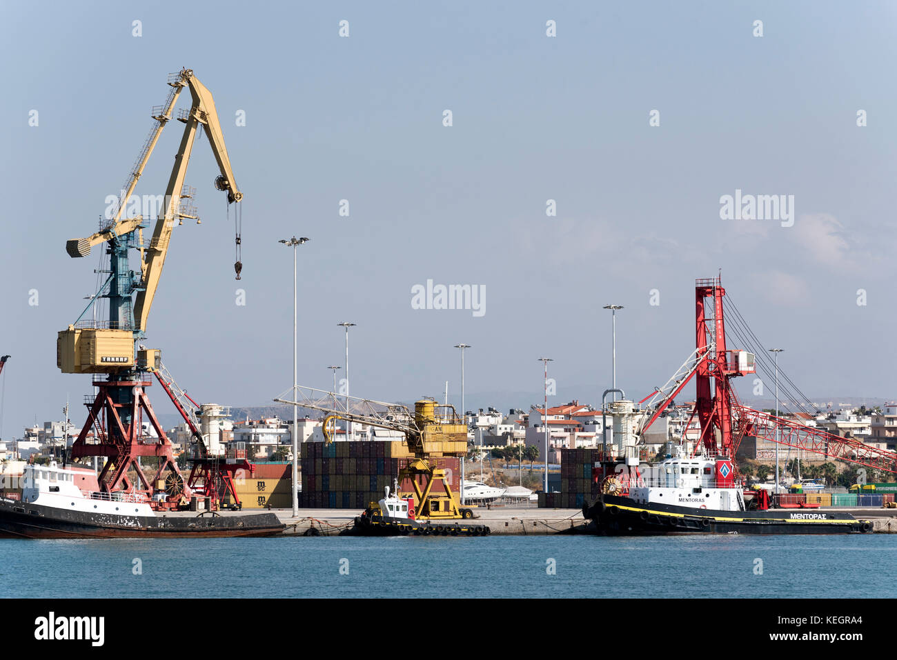 The Port of Heraklion, Crete, Greece, October 2017. Cranes line the waterfront. Stock Photo