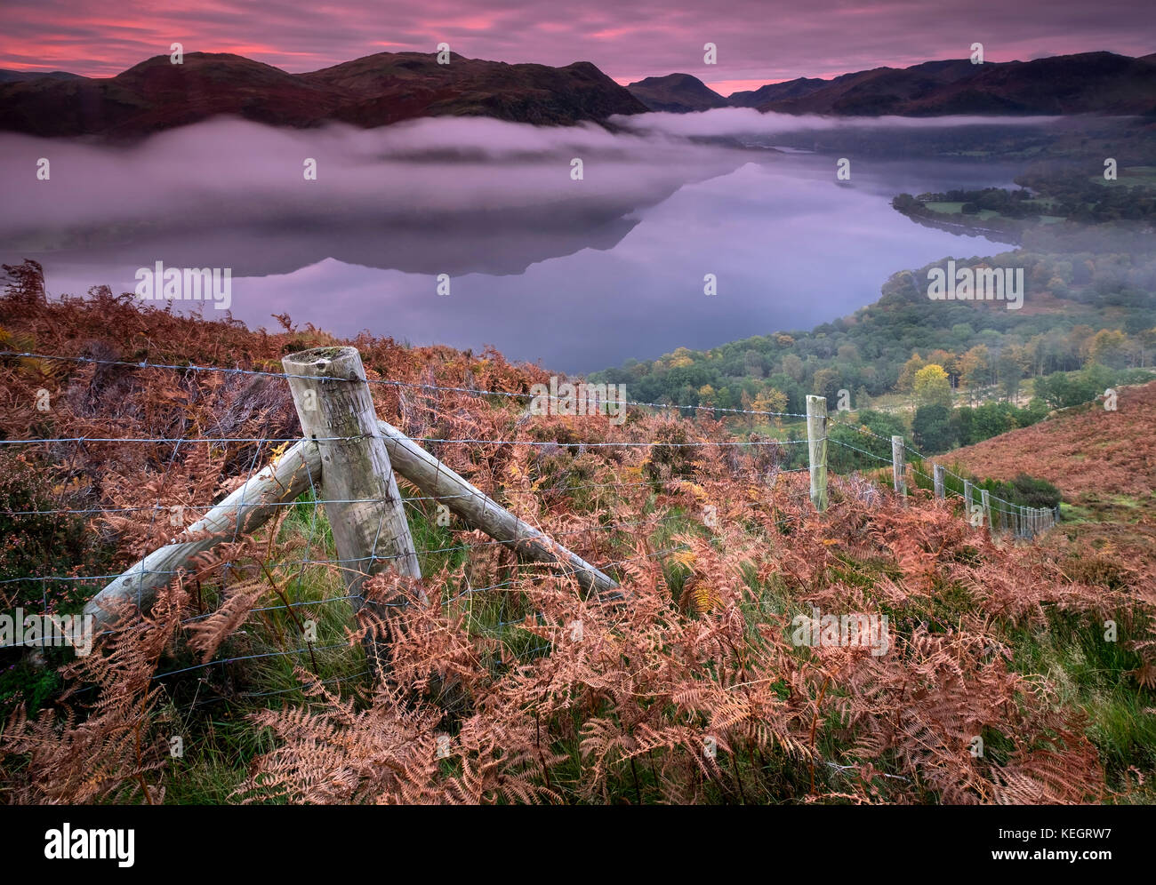 Into the Mist, Ullswater at Dawn from Gowbarrow Fell, Lake District National Park, Cumbria, England, UK Stock Photo