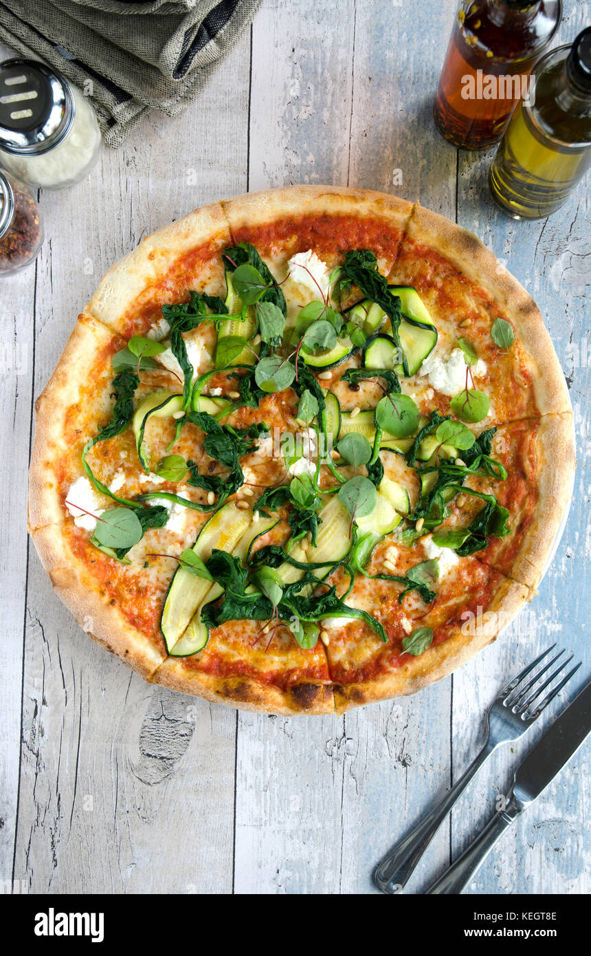 Vegetarian pizza topped with courgette and goats cheese Stock Photo Alamy
