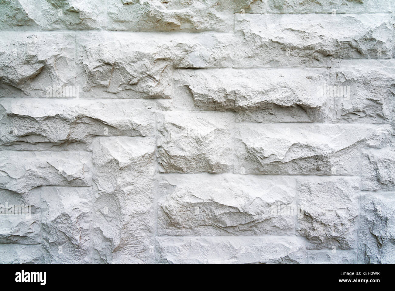 White stone cladding wall as a backdrop Stock Photo Alamy
